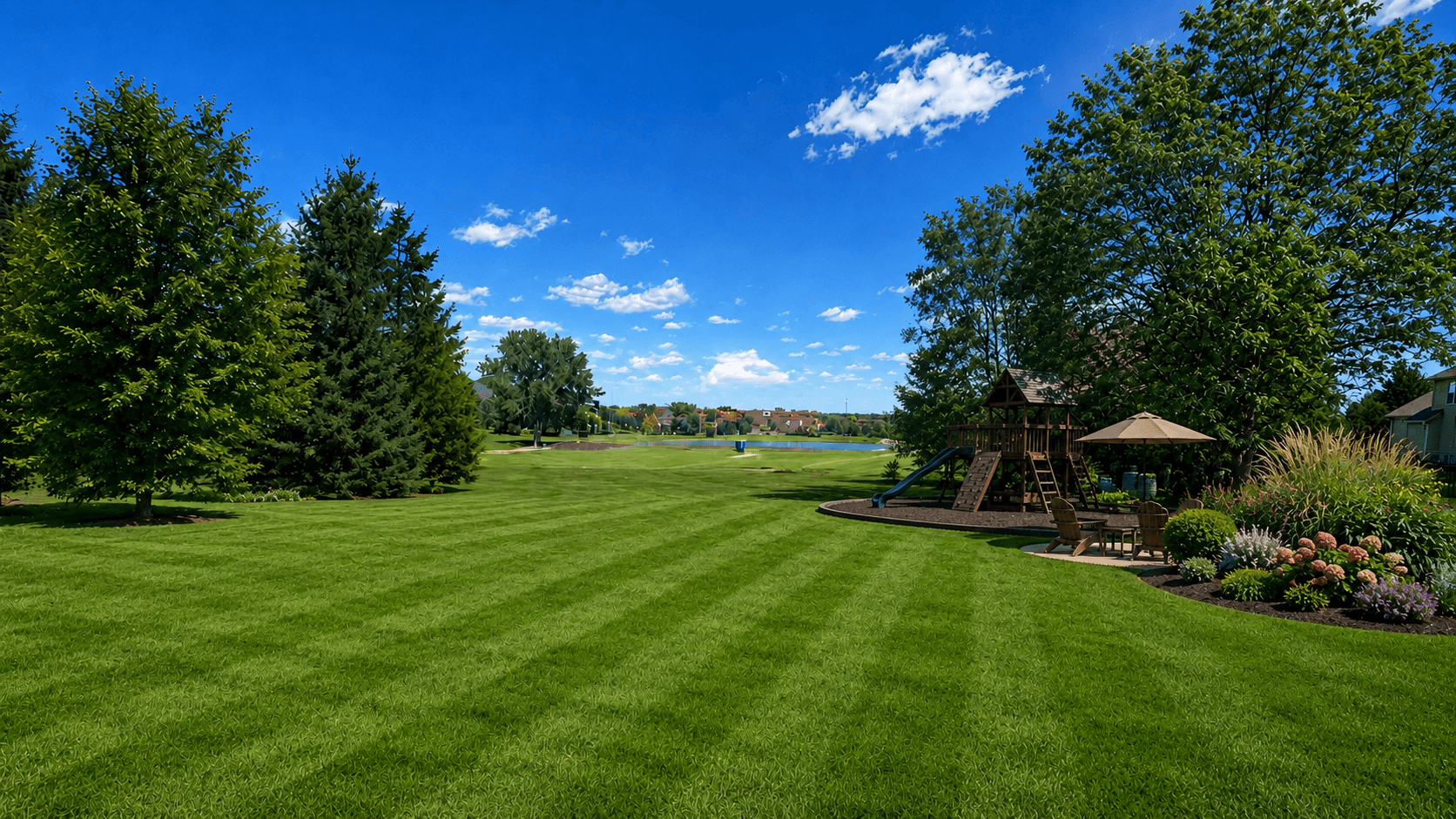 Grabill outdoor living concept with open lawn, golf course view, play area, and landscape planting